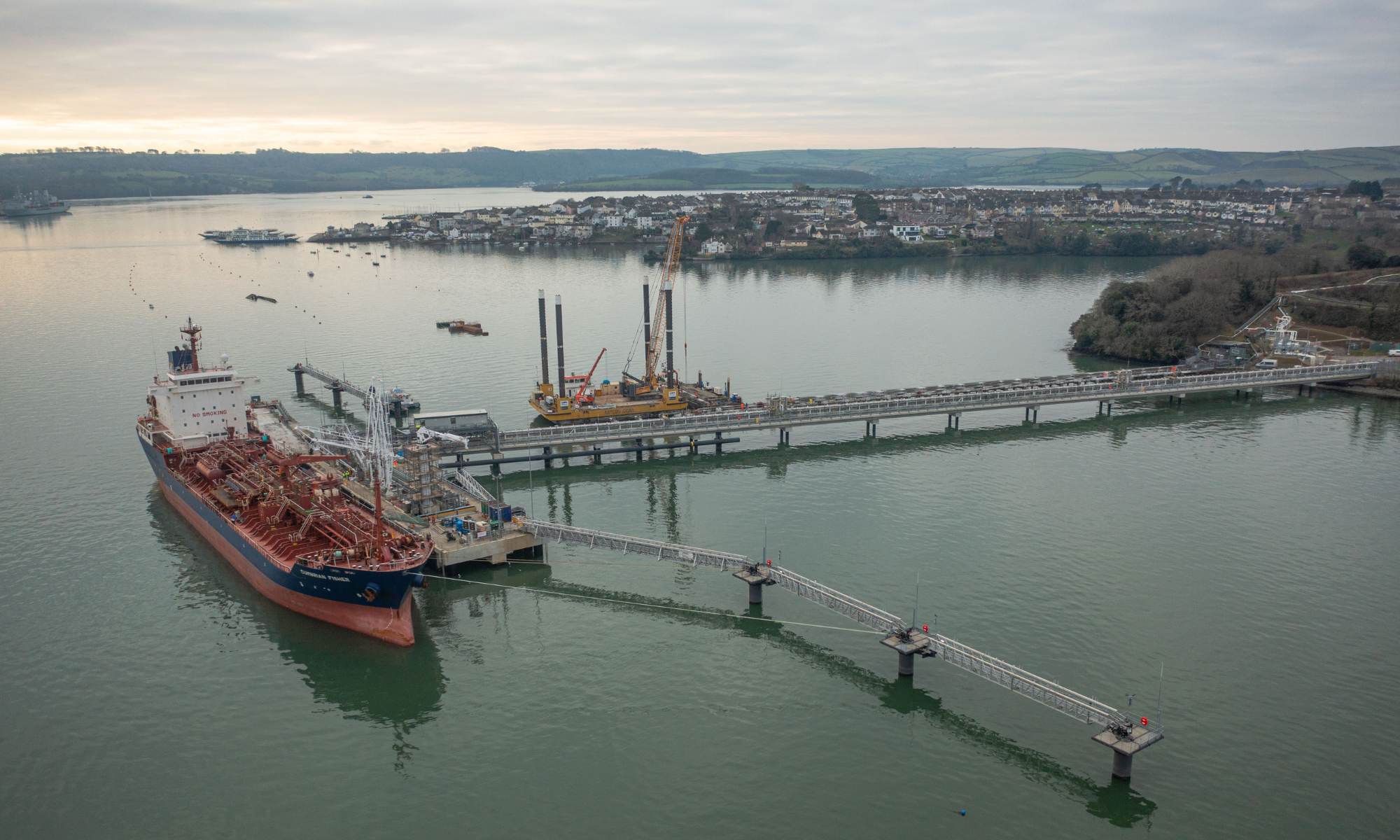 Aerial shot showing ship berthed at Thanckes Oil Fuel Jetty